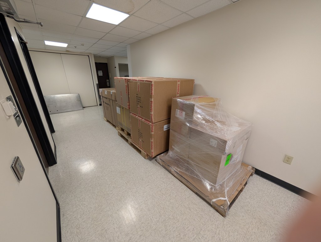 photo of cardboard boxes in hallway outside the lab